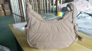 Casual lightweight padded crescent shoulder bag, stylish dumpling bag for daily commute.