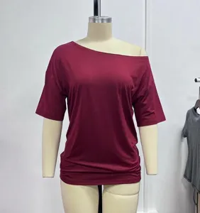 Casual off-shoulder burgundy t-shirt featuring a stylish loose fit and slanted neckline design.
