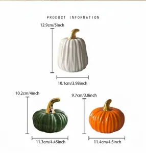 Ceramic pumpkin decoration set with gold stems, elegant tabletop art crafts for home decor.