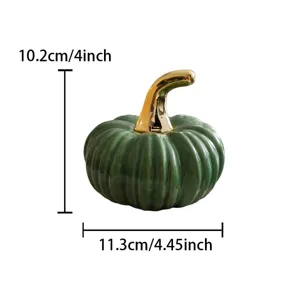 Ceramic pumpkin decor detail view showing height 10.2cm and width 11.3cm dimensions clearly.
