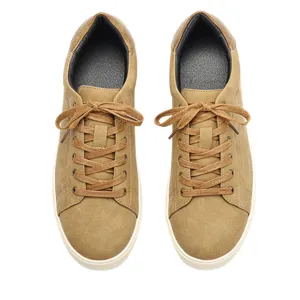 Men's brown leather casual sneakers, fashionable flat lace-up walking shoes for daily wear.