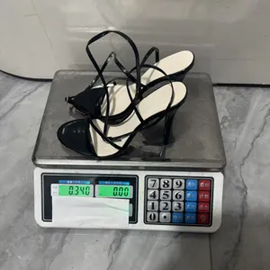 Fashion European women's high heel sandals, patent leather cross strap stilettos.