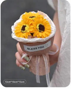 Mini artificial sunflower bouquet pocket gift wrapped with ribbon for home desktop decor.