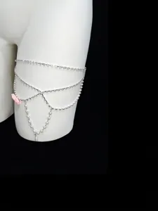 Multi-layer rhinestone pearl thigh chain with pink bow, trendy beach alloy leg body jewelry.
