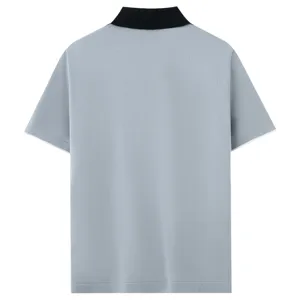 Detail view of the grey knitted short-sleeve polo shirt showcasing texture and collar.