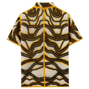 Detailed view of vintage wave pattern hollow knit short sleeve shirt for men summer style.