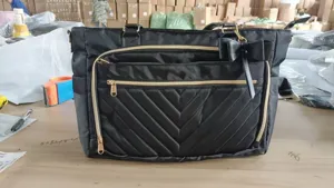 Sac cabas noir pour femme travail ordinateur portable bandoulière zips dorés élégant.