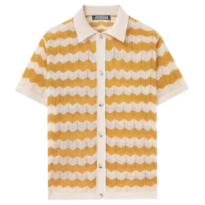 Close-up details of the yellow and white chevron knit polo shirt with breathable mesh fabric.