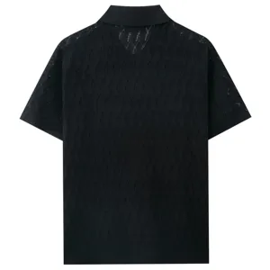 Detailed back view of a black short-sleeve knit polo shirt with breathable openwork pattern.