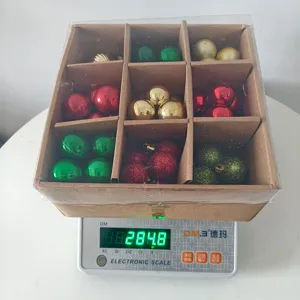 Christmas ball set detail showing 9-grid assorted plastic decorative hanging ornaments weighing 284g.