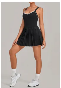 Black athletic tennis dress with white trim, activewear pleated dress for workout.