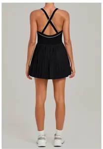 Black backless tennis dress back detail with cross straps and stylish pleated skirt.