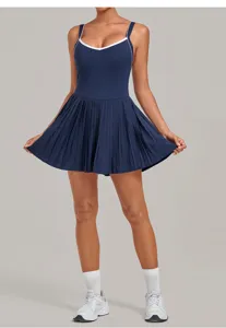 Dark blue backless tennis dress with white contrast trim, pleated athletic dress for fitness.