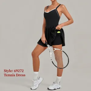 Black tennis dress for women, sleeveless athletic activewear with built-in shorts and pockets for sports.