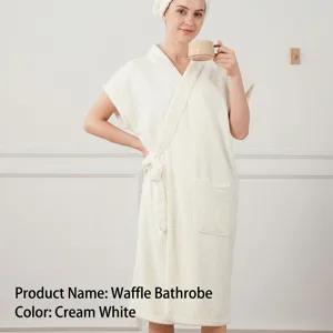 Waffle bath towel robe detail shot, soft absorbent cotton blend, sleeveless design with pocket.