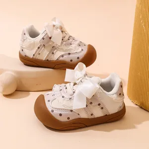 Scarpe primi passi bambina neonata suola morbida fiocco sneaker scarpe primavera nuova.