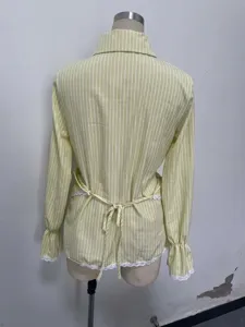 Detail shot of the striped long-sleeve shirt with waist tie and lace trim, back view.