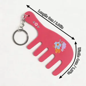 Cute pink comb shaped keychain with floral pattern, portable mini bag charm, size 6cm by 4cm.