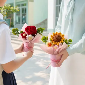 Handmade crochet flower bouquet in pink bucket, perfect gift for friends and loved ones.