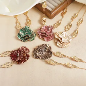 Exaggerated 3D irregular pleated flower and leaf pendant necklace, metallic finish jewelry detail.