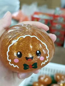 Christmas glitter decompression squeeze toy, cute cute face stress relief fidget toy for kids.