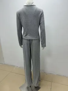 Women grey ribbed knit loungewear set long sleeve top and pants casual outfit.