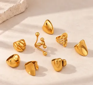 Anillos de acero titanio lisos exagerados, detalles de joyería dorada geométrica única para diario.