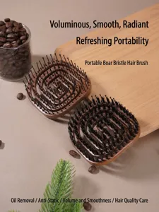 Portable boar bristle spiral hair brush for anti-static and smooth styling care.