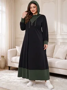 Plus size color-blocked hooded maxi dress with long sleeves, half zip and ribbed cuffs detail.
