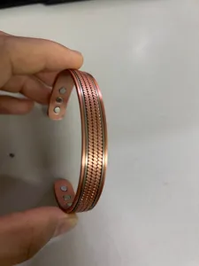 Vintage copper magnetic bracelet with woven wheat pattern, adjustable open cuff jewelry.
