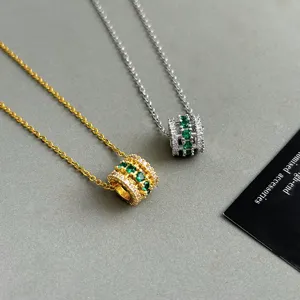 French light luxury sparkling diamond necklace, green stone cylinder pendant, clavicle chain.