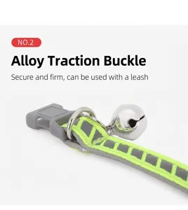 Reflective pet cat collar detail showing sturdy alloy traction buckle and metal bell.