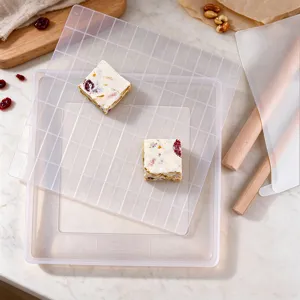 Large snowflake crisp nougat mold set with grid plate and rolling pin for DIY baking.