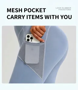 Close-up detail of high waist yoga pants with side mesh pocket for phone storage.