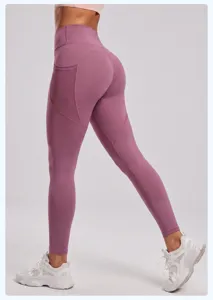 Detail shot of high waist yoga pants, featuring mesh side pockets and butt lifting design.