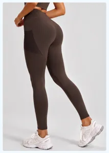 High-waist athletic yoga leggings with side mesh pockets and butt-lifting design for fitness running.