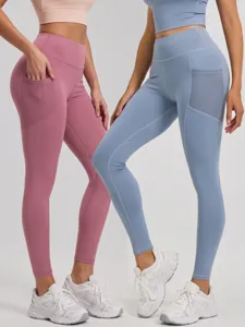 High waist yoga pants with mesh side pockets, stretch fitness leggings for workout and running.