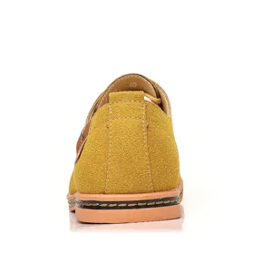 Detail view of the men's suede casual shoe back heel, showing stitching and texture.