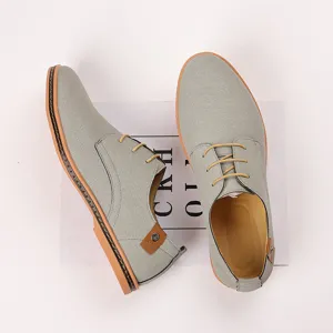 Men grey casual leather shoes with yellow laces and brown soles for spring outdoor daily wear.