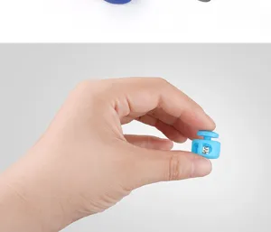 Blue plastic spring cord lock toggle stopper for apparel, bags, and sportswear adjustment.