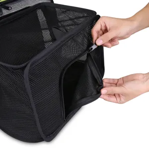 Black mesh breathable pet carrier bag detail view, foldable travel cat bag with zipper.