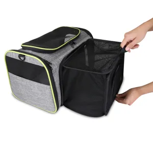Foldable pet carrier bag with expandable mesh, breathable grey travel handbag for cats and dogs.