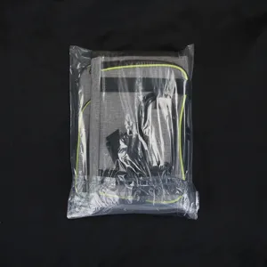 Detail view of the foldable pet carrier bag, showing breathable fabric and green trim.