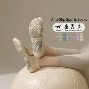Detailed view of women non-slip yoga socks, thick grip dots, warm cotton for pilates.