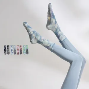 Non-slip yoga socks grip details, five toe design for professional pilates and fitness training.