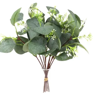 Kunstmatige eucalyptus tak met witte bessen nepplant groen voor tafeldecoratie thuis