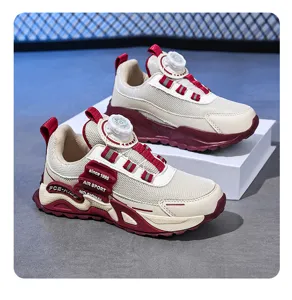 Kids breathable mesh outdoor running shoes with rotary buckle design in beige and burgundy.