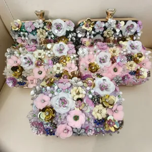 Handmade floral beaded evening clutch bag detail view, exquisite sequins and sparkling rhinestones.