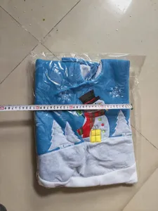 Cartoon Christmas tree skirt with festive snowman embroidery and soft plush design.