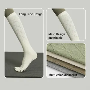 Detail view of breathable five-toe yoga socks with anti-slip grip and mesh diamond knit design.